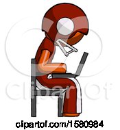 Poster, Art Print Of Orange Football Player Man Using Laptop Computer While Sitting In Chair View From Side
