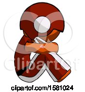 Poster, Art Print Of Orange Football Player Man Sitting With Head Down Facing Sideways Right