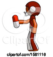 Orange Football Player Man Holding Red Pill Walking To Left