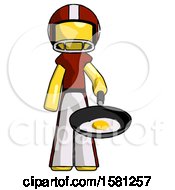 Yellow Football Player Man Frying Egg In Pan Or Wok