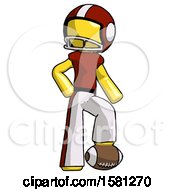 Yellow Football Player Man Standing With Foot On Football
