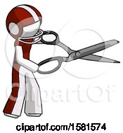 White Football Player Man Holding Giant Scissors Cutting Out Something