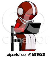 Poster, Art Print Of Red Football Player Man Using Laptop Computer While Sitting In Chair Angled Right