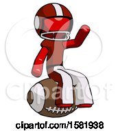 Red Football Player Man Sitting On Giant Football
