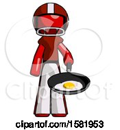 Red Football Player Man Frying Egg In Pan Or Wok