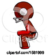 Red Football Player Man Squatting Facing Left