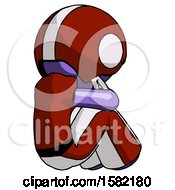 Poster, Art Print Of Purple Football Player Man Sitting With Head Down Back View Facing Right