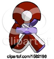 Poster, Art Print Of Purple Football Player Man Sitting With Head Down Facing Sideways Right