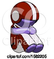 Poster, Art Print Of Purple Football Player Man Sitting With Head Down Facing Angle Right