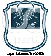 Clipart Of A Pair Of Headphones And Speakers In A Shield Royalty Free Vector Illustration by Vector Tradition SM