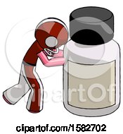 Pink Football Player Man Pushing Large Medicine Bottle