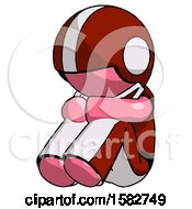Poster, Art Print Of Pink Football Player Man Sitting With Head Down Facing Angle Left