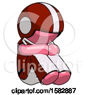Poster, Art Print Of Pink Football Player Man Sitting With Head Down Facing Angle Right