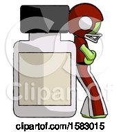Green Football Player Man Leaning Against Large Medicine Bottle