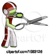 Green Football Player Man Holding Giant Scissors Cutting Out Something