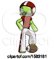 Poster, Art Print Of Green Football Player Man Standing With Foot On Football