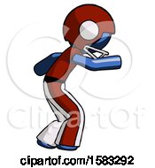 Blue Football Player Man Sneaking While Reaching For Something