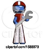 Blue Football Player Man Holding Large Wrench With Both Hands