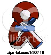 Poster, Art Print Of Blue Football Player Man Sitting With Head Down Facing Sideways Right