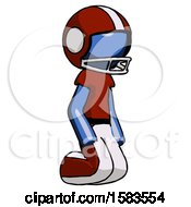 Poster, Art Print Of Blue Football Player Man Kneeling Angle View Right