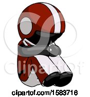 Poster, Art Print Of Black Football Player Man Sitting With Head Down Facing Angle Right