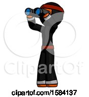 Orange Ninja Warrior Man Looking Through Binoculars To The Left