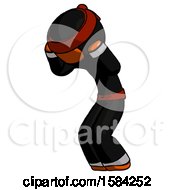 Orange Ninja Warrior Man With Headache Or Covering Ears Turned To His Left