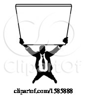 Poster, Art Print Of Silhouetted Business Man Holding Up A Sign