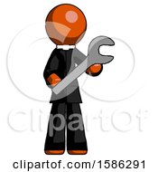 Orange Clergy Man Holding Large Wrench With Both Hands