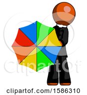 Orange Clergy Man Holding Rainbow Umbrella Out To Viewer