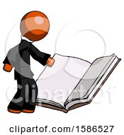 Orange Clergy Man Reading Big Book While Standing Beside It