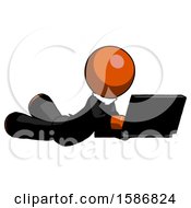 Poster, Art Print Of Orange Clergy Man Using Laptop Computer While Lying On Floor Side Angled View