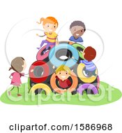 Group Of Children Playing In A Tire Dome In The Playground
