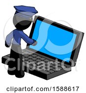 Black Police Man Using Large Laptop Computer