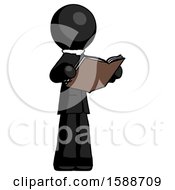 Black Clergy Man Reading Book While Standing Up Facing Away