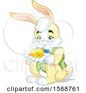 Poster, Art Print Of Yellow Easter Bunny Rabbit Holding A Chick
