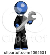 Blue Clergy Man Holding Large Wrench With Both Hands