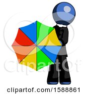 Blue Clergy Man Holding Rainbow Umbrella Out To Viewer
