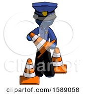 Blue Police Man Holding A Traffic Cone