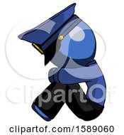 Blue Police Man Sitting With Head Down Facing Sideways Left