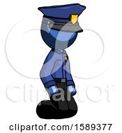 Blue Police Man Kneeling Angle View Right