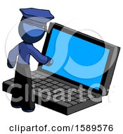 Blue Police Man Using Large Laptop Computer