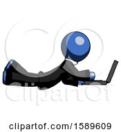 Poster, Art Print Of Blue Clergy Man Using Laptop Computer While Lying On Floor Side View