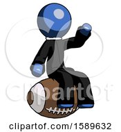Poster, Art Print Of Blue Clergy Man Sitting On Giant Football
