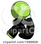 Poster, Art Print Of Green Clergy Man Sitting With Head Down Facing Sideways Left