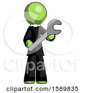 Green Clergy Man Holding Large Wrench With Both Hands