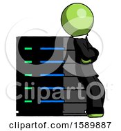 Poster, Art Print Of Green Clergy Man Resting Against Server Rack Viewed At Angle