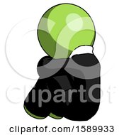 Poster, Art Print Of Green Clergy Man Sitting With Head Down Back View Facing Left