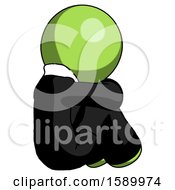 Poster, Art Print Of Green Clergy Man Sitting With Head Down Back View Facing Right
