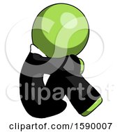 Poster, Art Print Of Green Clergy Man Sitting With Head Down Facing Sideways Right